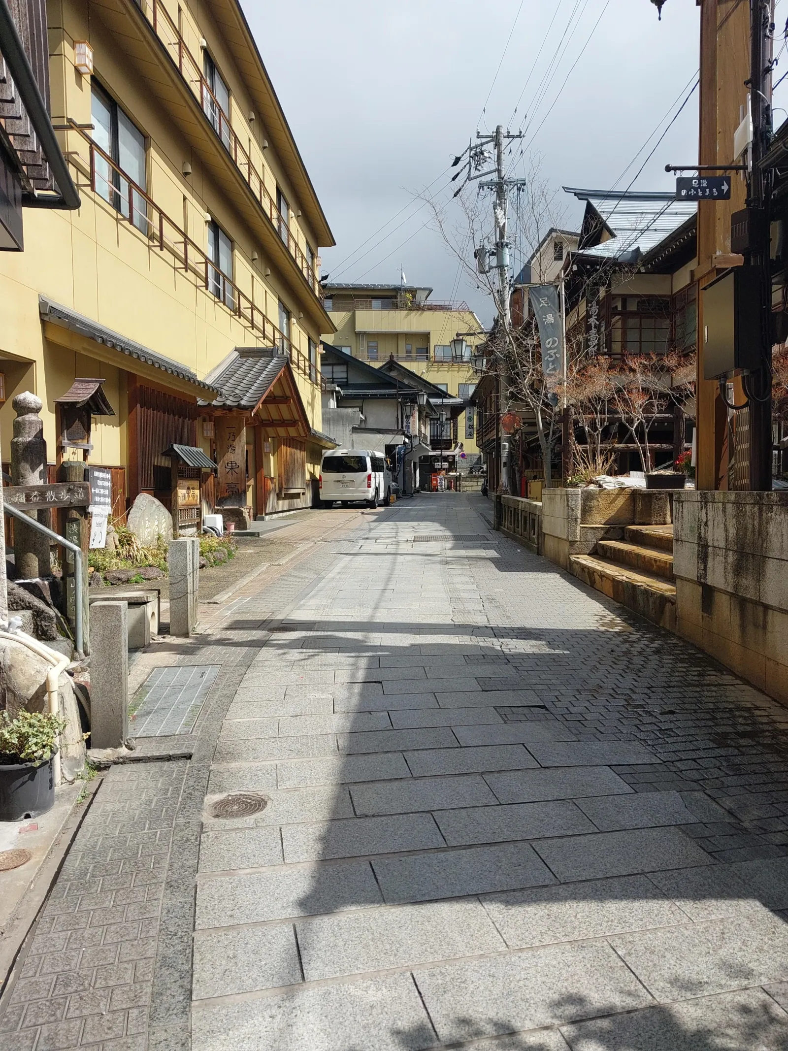 Shibu Onsen's lantern-lined street between wooden inns