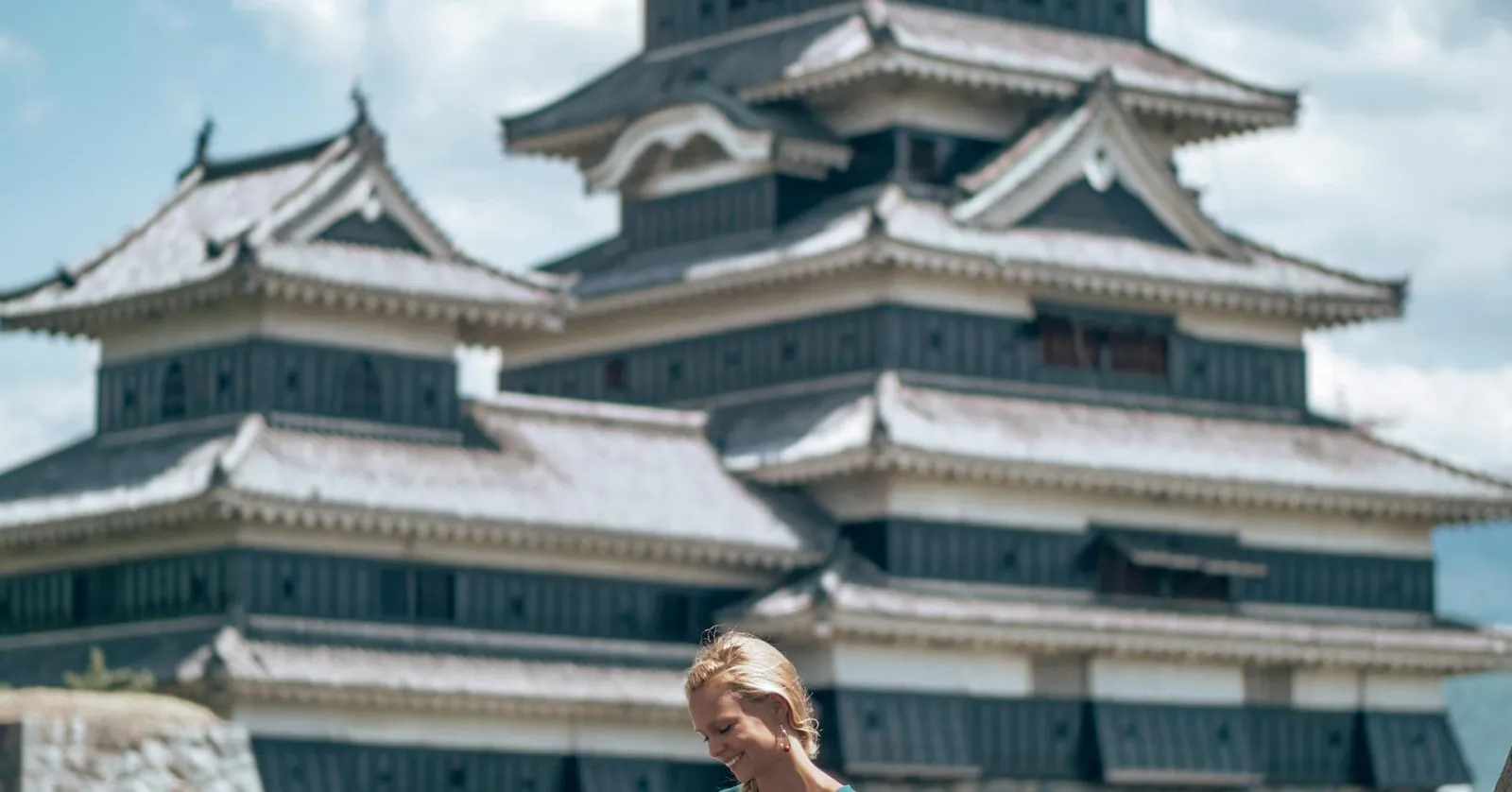 The black keep of Matsumoto Castle under a clear winter sky